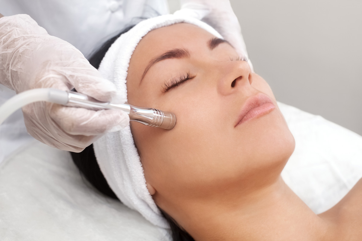 A person receiving a microdermabrasion treatment in Richmond.